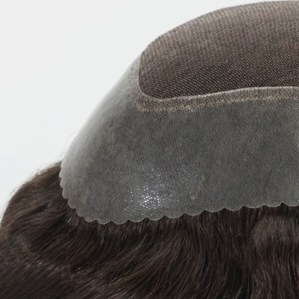 A close up of the top portion of a wig
