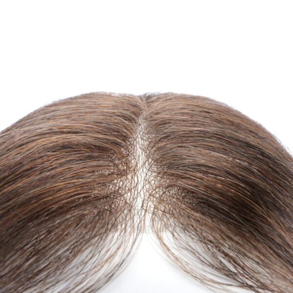 A close up of the back of a woman 's hair