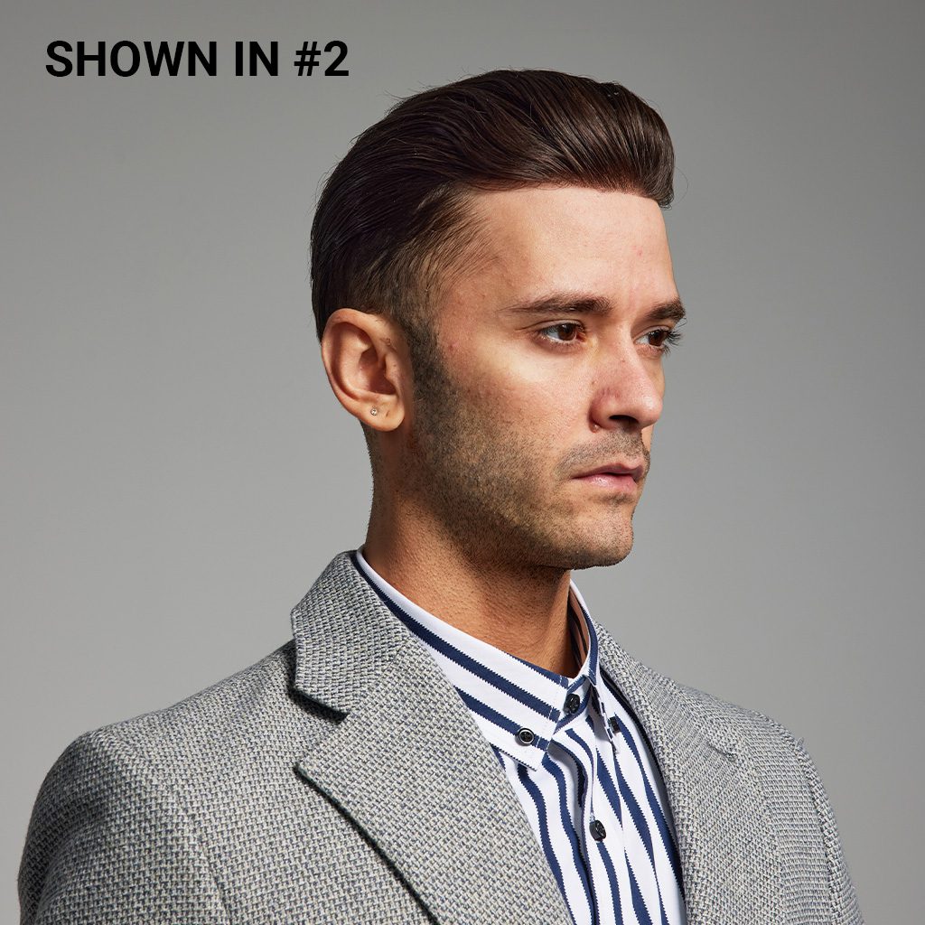A man with short hair and wearing a jacket.